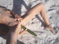 Tight Pussy takes a Hot Golden Shower while being Penetrated by a Cucumber on the Beach