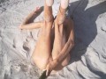 Tight Pussy takes a Hot Golden Shower while being Penetrated by a Cucumber on the Beach