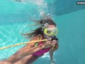 Cute teen Irina Poplavok swims naked underwater