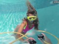 Cute teen Irina Poplavok swims naked underwater