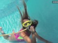 Cute teen Irina Poplavok swims naked underwater