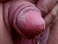 Huge flaccid penis peeing outdoors
