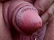 Huge flaccid penis peeing outdoors