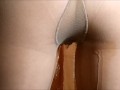 Pissing in natural color stockings