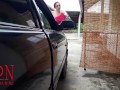 A lady masturbates in a car in a parking lot Teasing a clit with a dildo