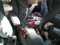 Masturbation in car with black dildo while wearing pearls