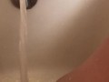 Horny hot thick MILF wiggles hips and uses bath tub faucet to get off in bathtub
