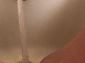 Horny hot thick MILF wiggles hips and uses bath tub faucet to get off in bathtub