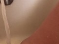 Horny hot thick MILF wiggles hips and uses bath tub faucet to get off in bathtub