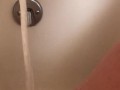 Horny hot thick MILF wiggles hips and uses bath tub faucet to get off in bathtub
