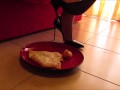 High heels and barefoot crush of a cream cake