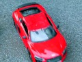 Crush of Red Audi R8 model toy car with Black Pump Stilettos