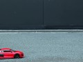 Crush of Red Audi R8 model toy car with Black Pump Stilettos