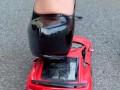 Crush of Red Audi R8 model toy car with Black Pump Stilettos