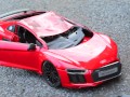 Crush of Red Audi R8 model toy car with Black Pump Stilettos