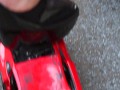 Crush of Red Audi R8 model toy car with Black Pump Stilettos