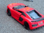 Crush of Red Audi R8 model toy car with Black Pump Stilettos