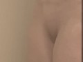 Milf seductively showers and plays with large, pierced breasts and horny, pierced pussy