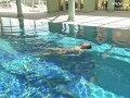 Hot US blondie Lindsay Cruz swims naked in the pool