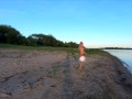 Русская нудистка на берегу реки