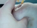 Slut comes while stitching needle in nipple