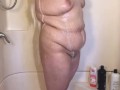 Thick MILF gets soapy washing hair and body in shower