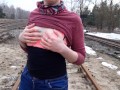 Girl undresses on the train tracks