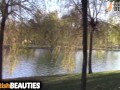 Barefoot brunette teases everyone in a public city park