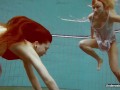 Two hot chicks enjoy swimming pool naked