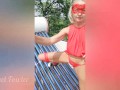 Hot milf goes to the roof on a dangerous iron ladder to pee on the solar panel