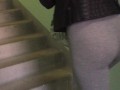 Sexy Girl with pumped ass in leggings climbs the stairs