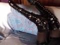 Laura on Heels amateur 2021 on a sofa wearing black sexy platform boots over the knees
