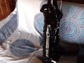 Laura on Heels amateur 2021 on a sofa wearing black sexy platform boots over the knees