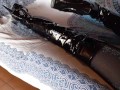 Laura on Heels amateur 2021 on a sofa wearing black sexy platform boots over the knees