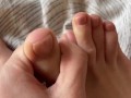 Toes with beige pedicure