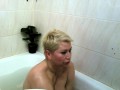 Mature Russian bitch masturbates in the shower and cums beautifully