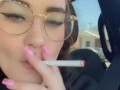 Smoking a cigarette in the car