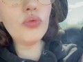 Smoking a cigarette in the car