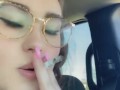 Smoking a cigarette in the car