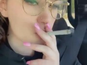 Smoking a cigarette in the car