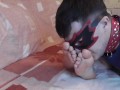 Slave kisses feet of his pregnant wife while she chatting with her lover