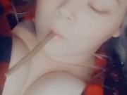 Tits out smoking a blunt