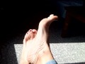 Playing with my feet while they sunbathe !!