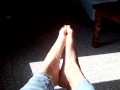 Playing with my feet while they sunbathe !!