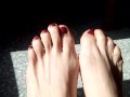Playing with my feet while they sunbathe !!