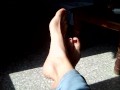 Playing with my feet while they sunbathe !!