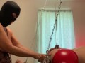 Mistress pegging sub suspended in chains to the ceiling part 1