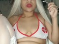 Sexy nurse mjane smoking a J