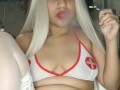 Sexy nurse mjane smoking a J