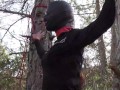 Tied to a tree on a sexy outfit, masked and outdoor deepthroat with no mercy